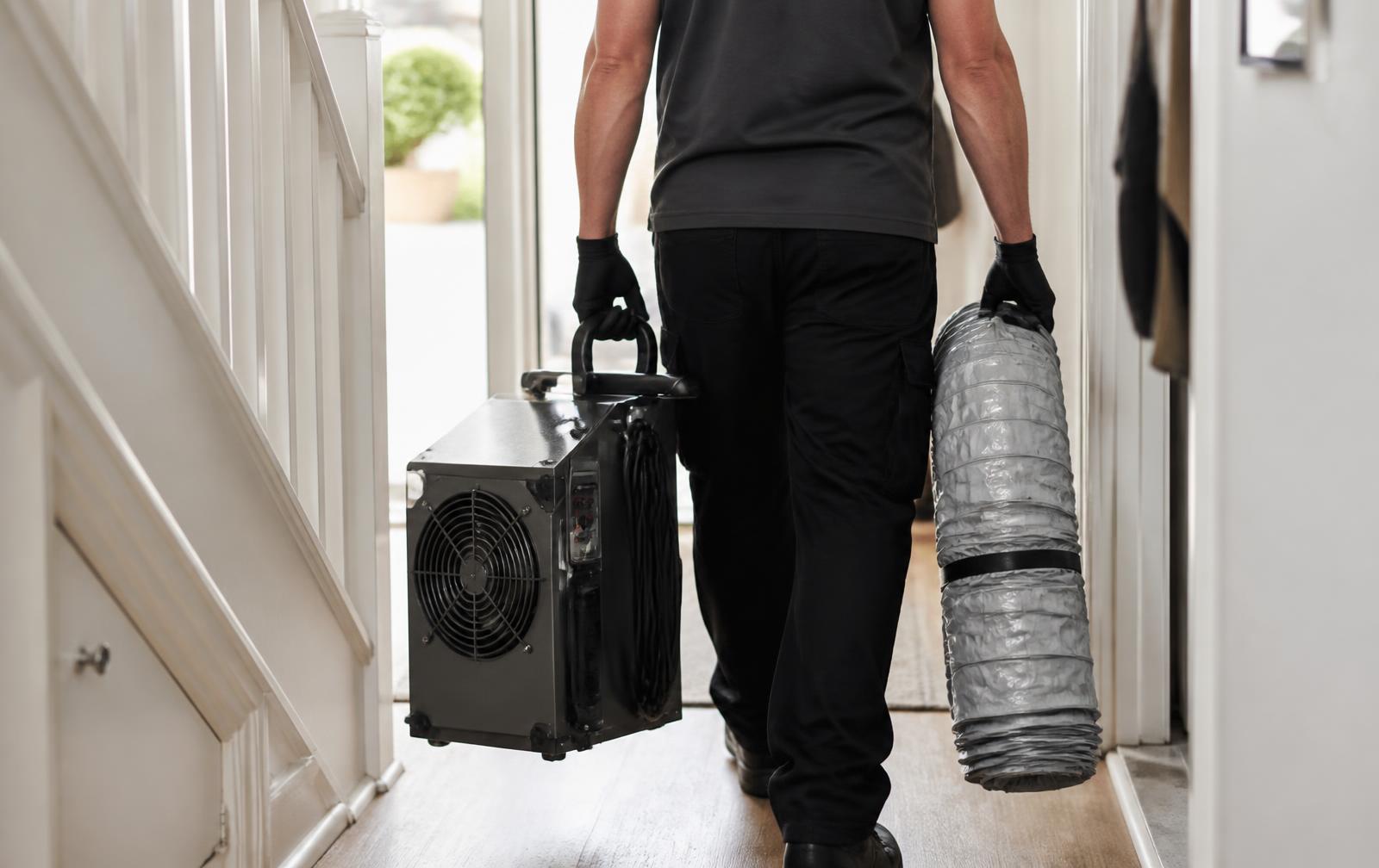 Professional bed bug heat treatment equipment being brought into a property